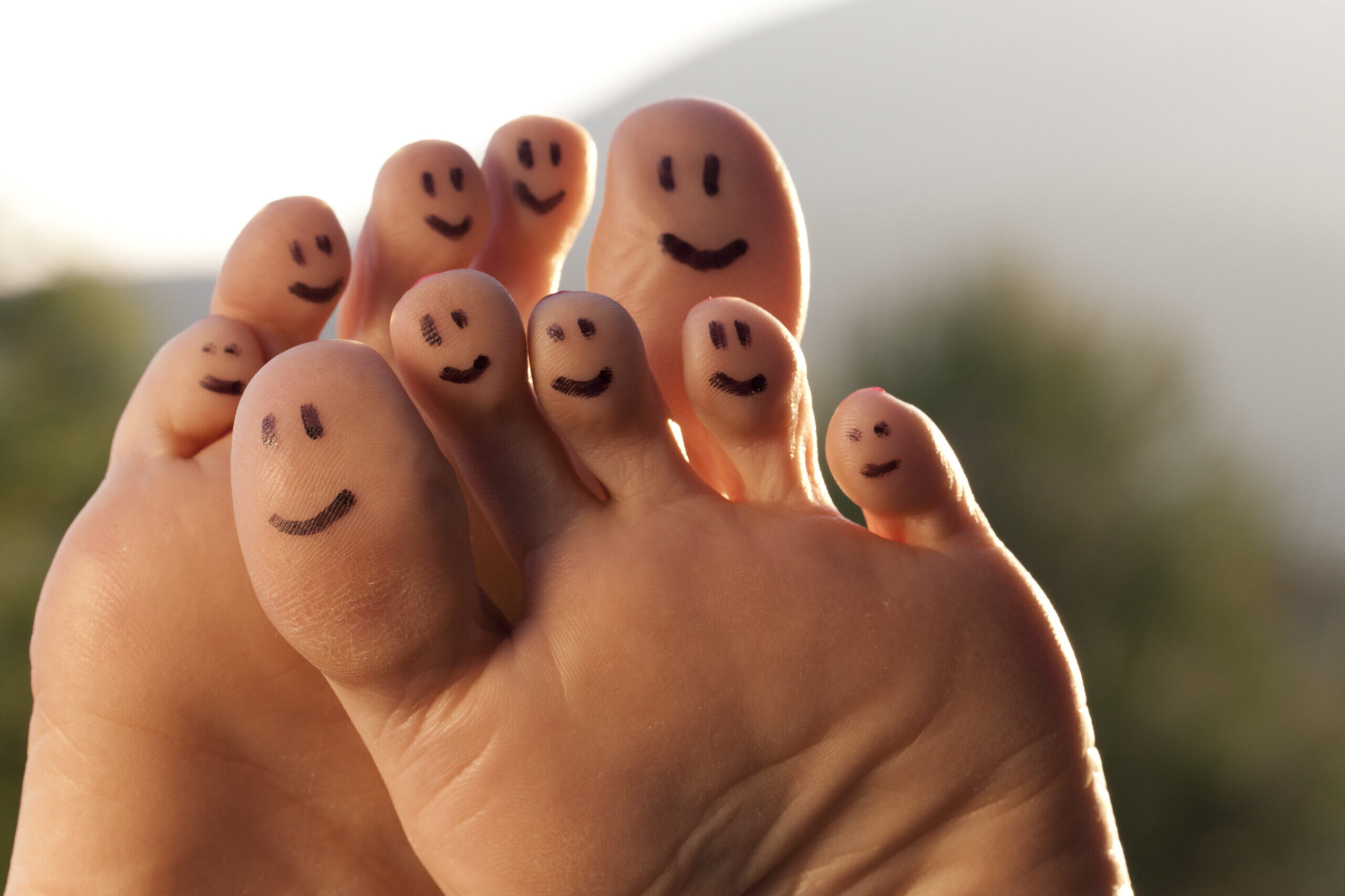 Smiles on a person's toes